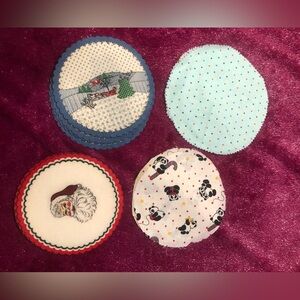 Set of four Christmas-themed fabric coasters